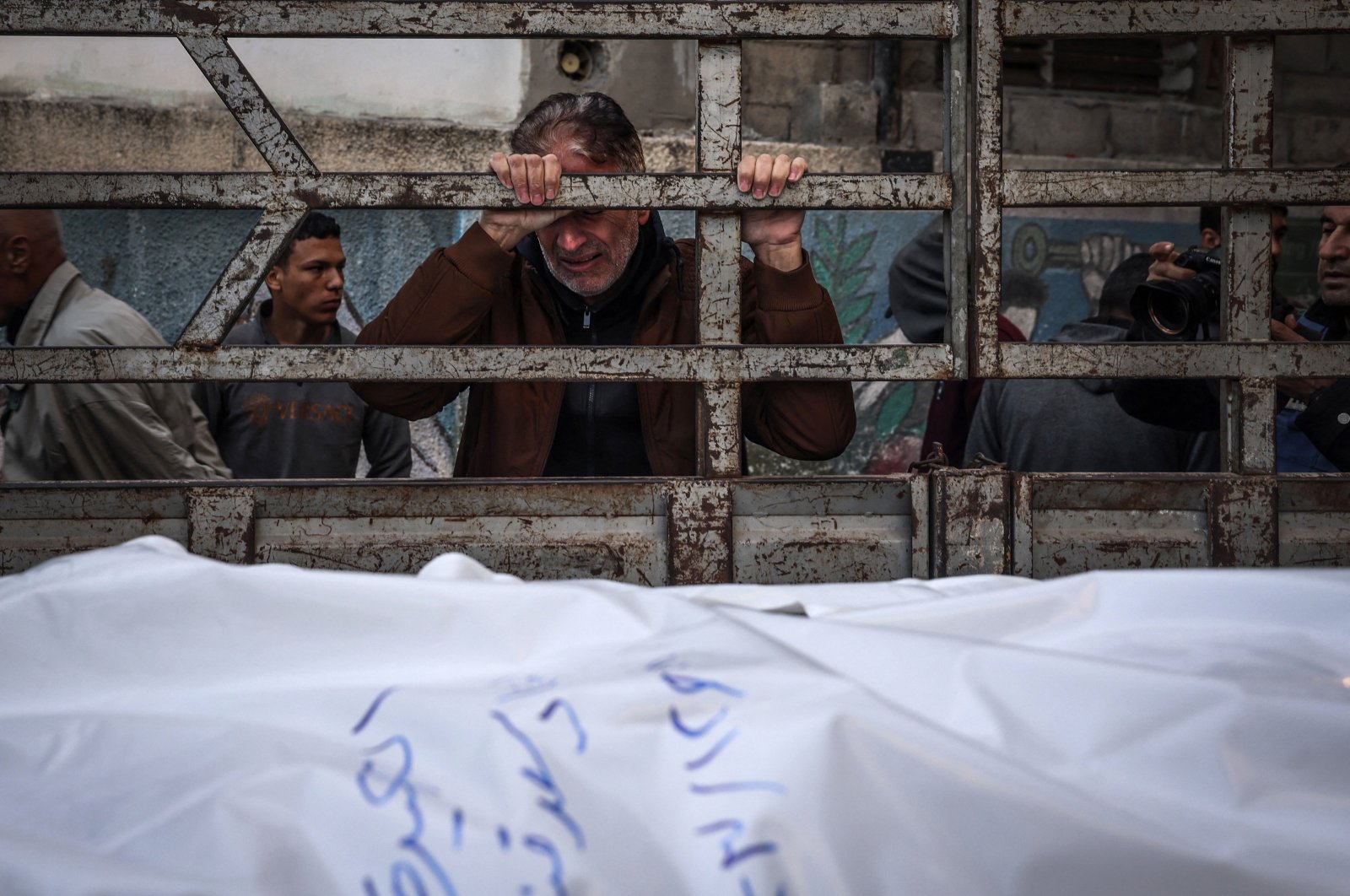 A man mourns his loved ones killed during Israeli bombardment in Rafah, southern Gaza Strip, Palestine, Dec. 29, 2023. (AFP Photo)