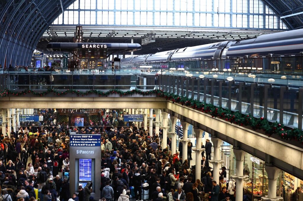 Passengers wait for news of Eurostar departures at St Pancras station in London on Dec. 30, 2023. (AFP Photo)