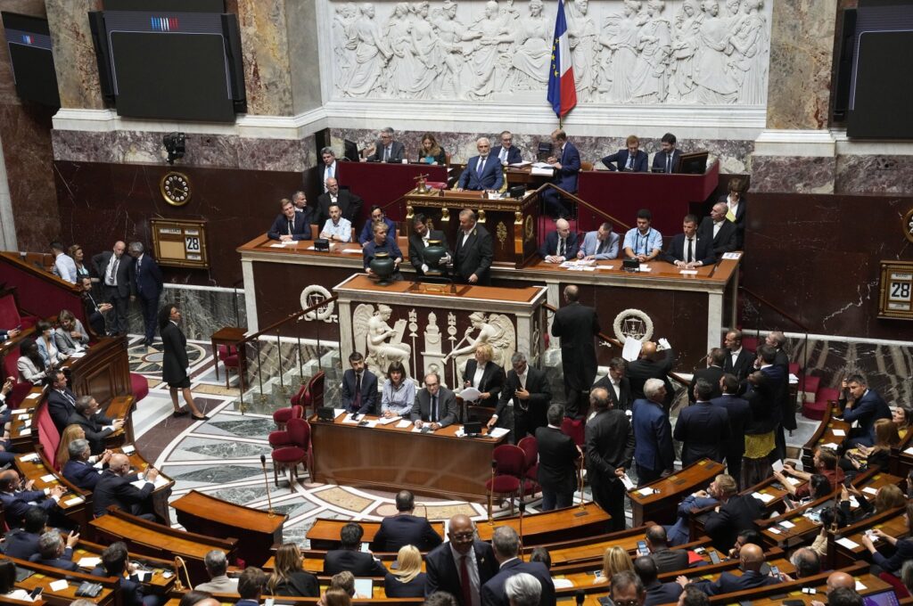 Far-right National Rally's Jose Gonzalez (Top C), the oldest parliament member, chairs the National Assembly as parliament members vote to elect the house speaker, in Paris, France, June 28, 2022. (AP Photo)