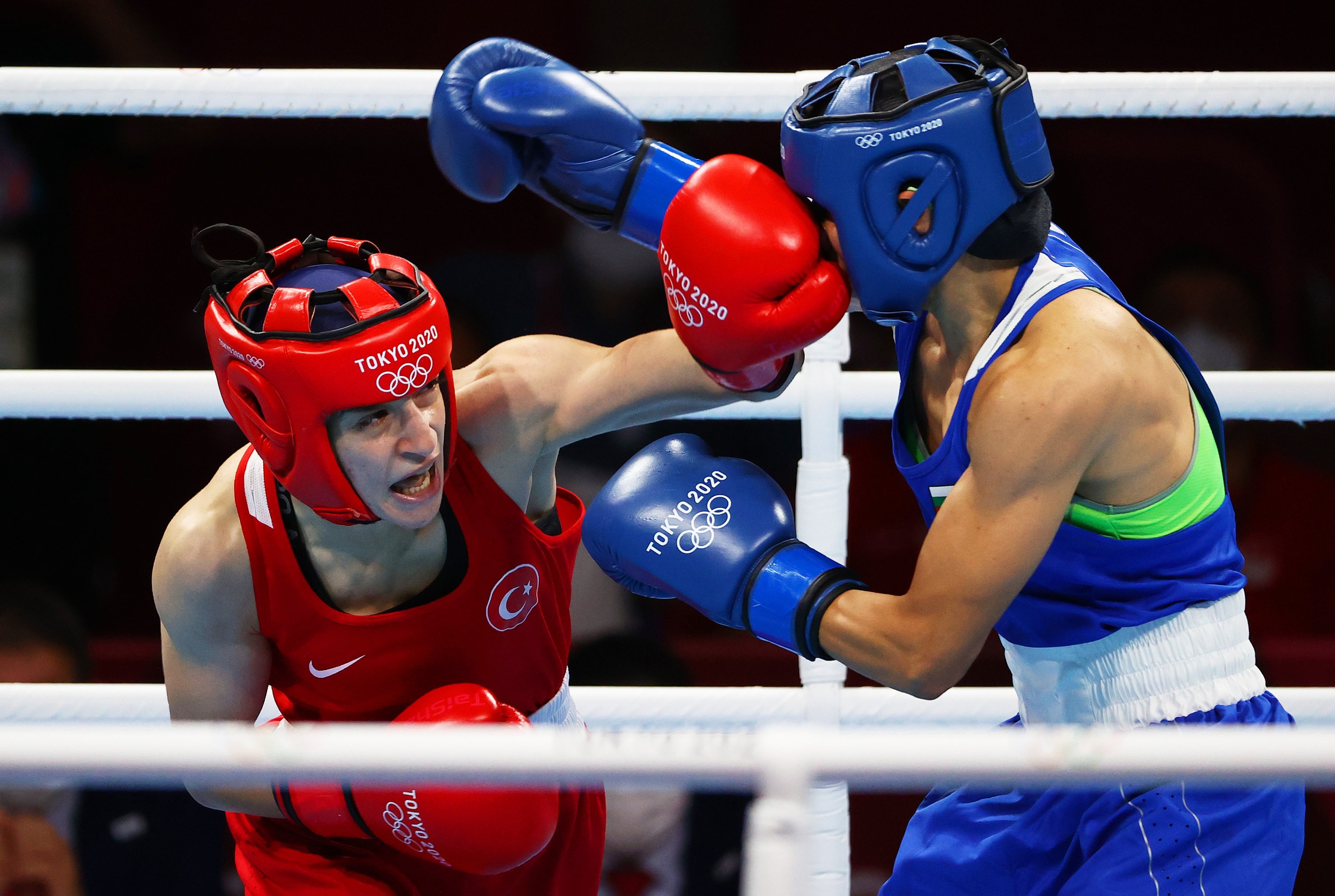 308569 Türkiye's Buse Naz Cakıroğlu (L) punches Bulgaria's Stoyka Zhelyazkova Krasteva during the Women's Fly (48-51 kg.) final bout at the Tokyo 2020 Olympic Games at Kokugikan Arena, Tokyo, Japan, Aug. 7, 2021. (Getty Images Photo)