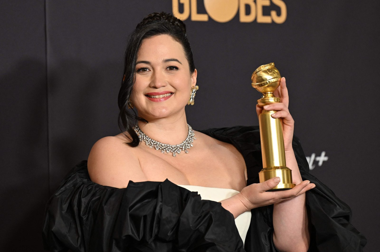 U.S. actress Lily Gladstone poses with the award for Best Performance by a Female Actor in a Motion Picture - Drama for "Killers of the Flower Moon" in the press room during the 81st annual Golden Globe Awards, Beverly Hills, California, U.S., Jan. 7, 2024. (AFP Photo)