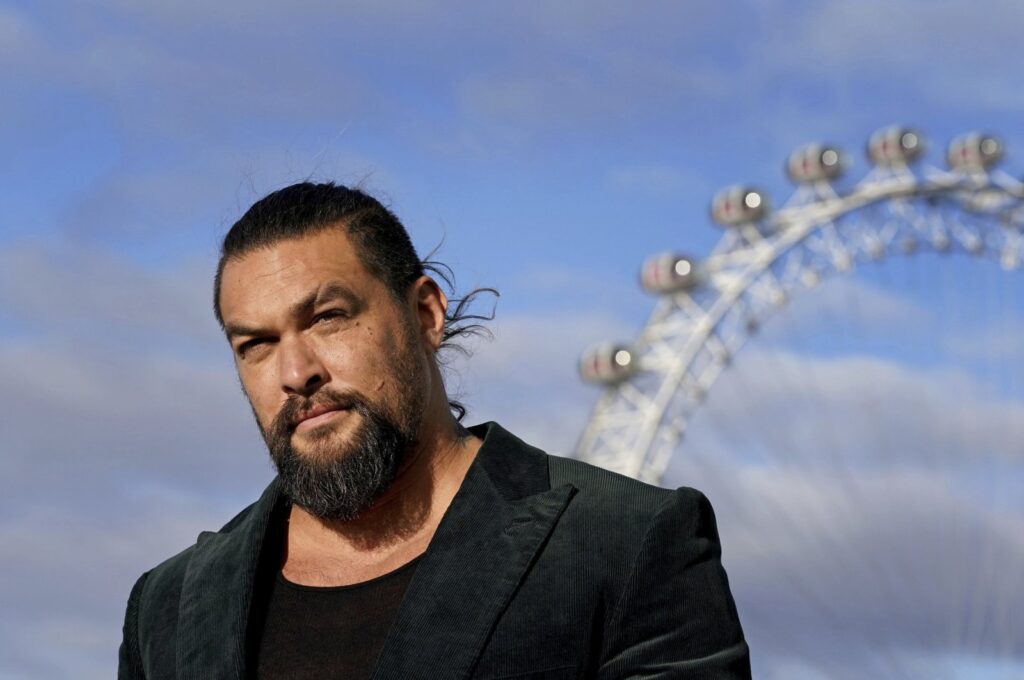 Jason Momoa poses during a photocall for "Aquaman and the Lost Kingdom," at Park Plaza Hotel in Westminster Bridge, London, U.K., Dec. 11, 2023. (AP Photo)