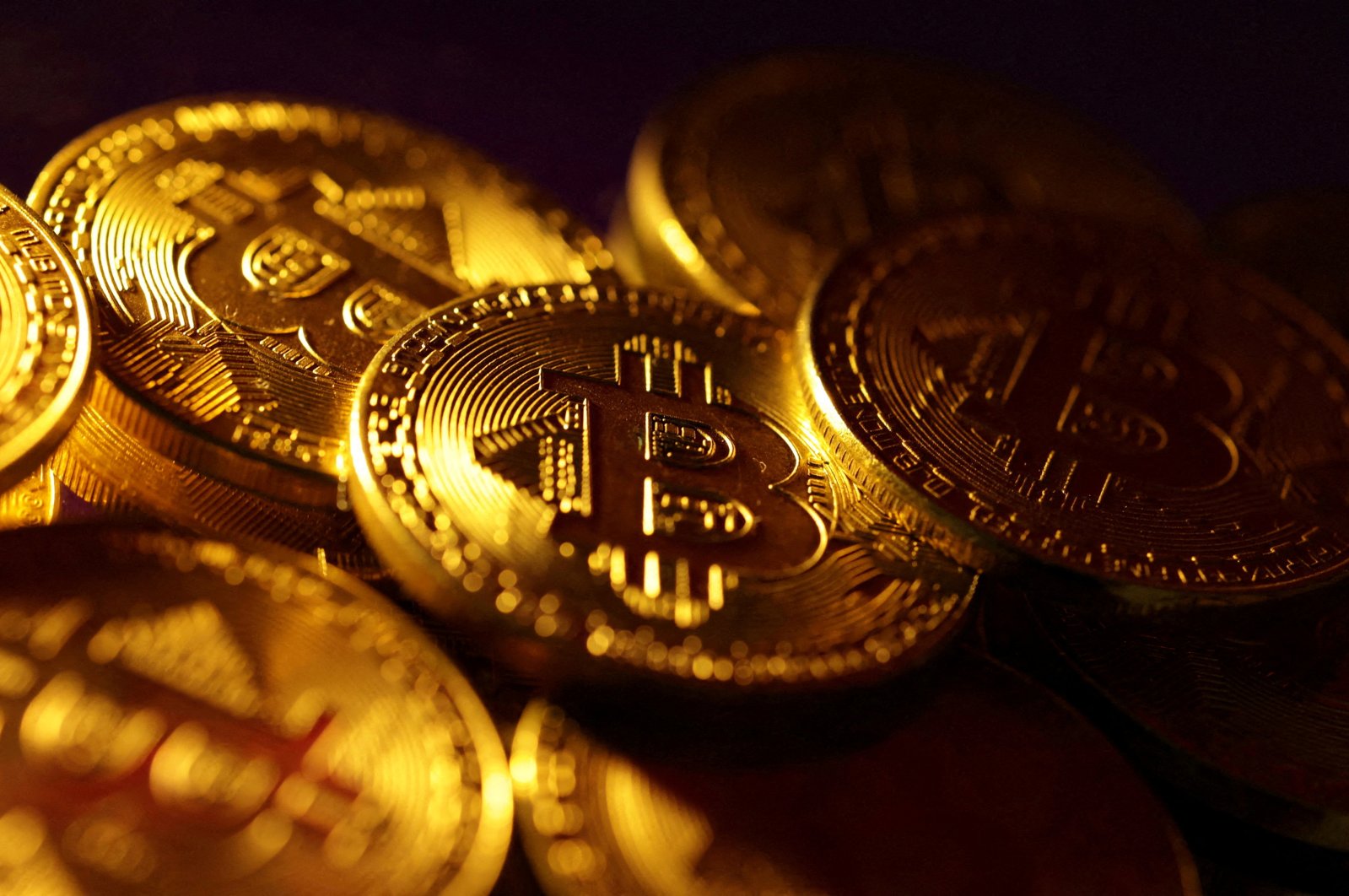 Physical representations of the bitcoin cryptocurrency are seen in this illustration taken Oct. 24, 2023. (Reuters Photo)