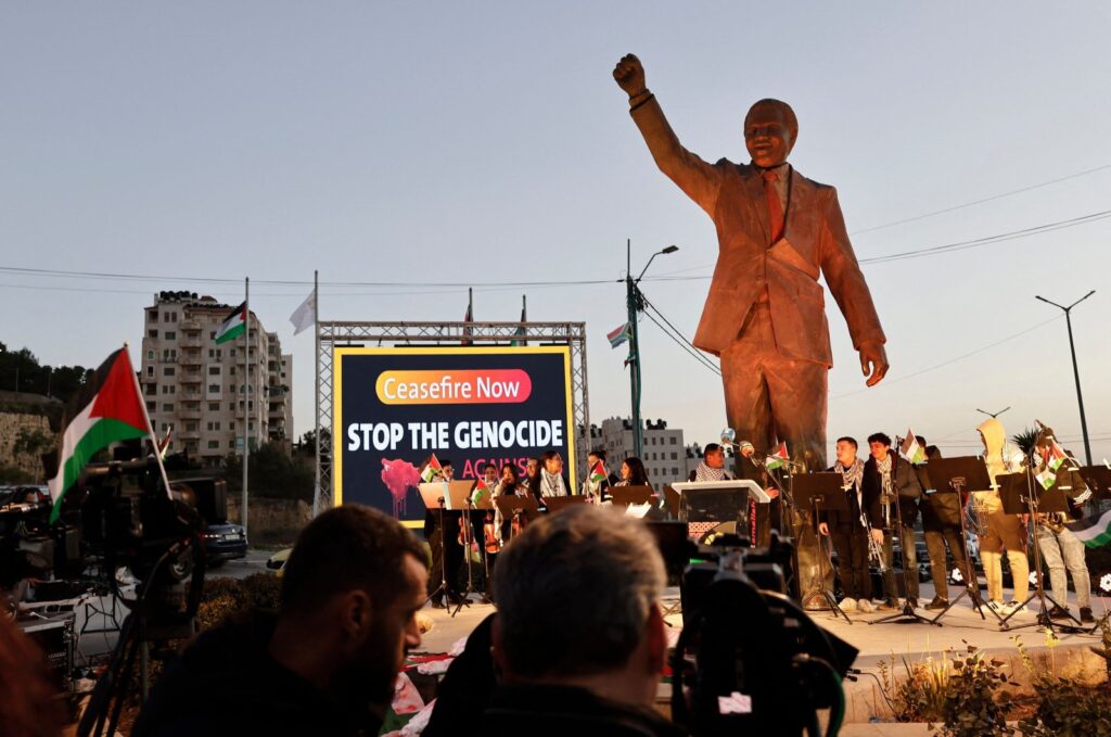 The statue of late South African President Nelson Mandela stands in Ramallah on the eve of South Africa's "genocide" case against Israel goes to the International Court of Justice, Jan. 10, 2024. (AFP Photo)