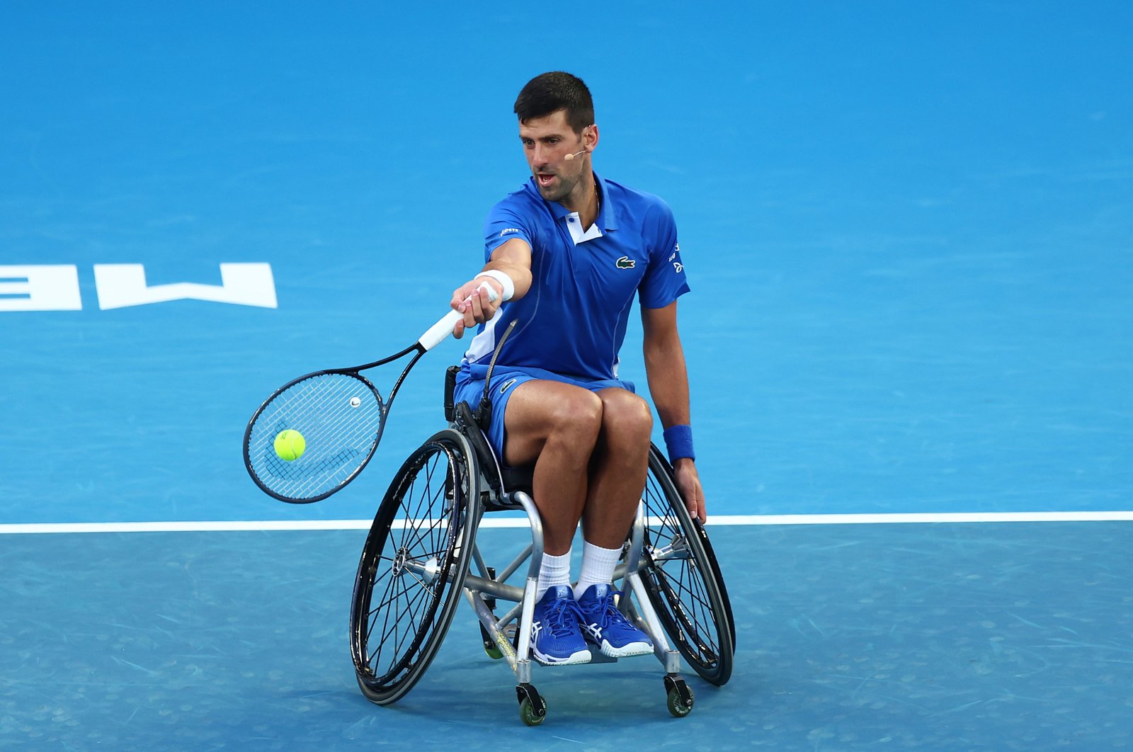 Serbia's Novak Djokovic plays a shot during A Night with Novak & Friends at Rod Laver Arena ahead of the 2024 Australian Open at Melbourne Park, Melbourne, Australia, Jan. 11, 2024. (Getty Images Photo)