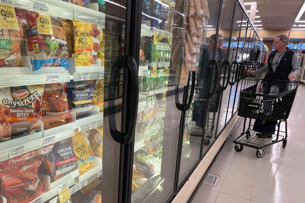 A customer shops for frozen food at a grocery store in San Anselmo, California, U.S., Dec. 12, 2023. (AFP Photo)