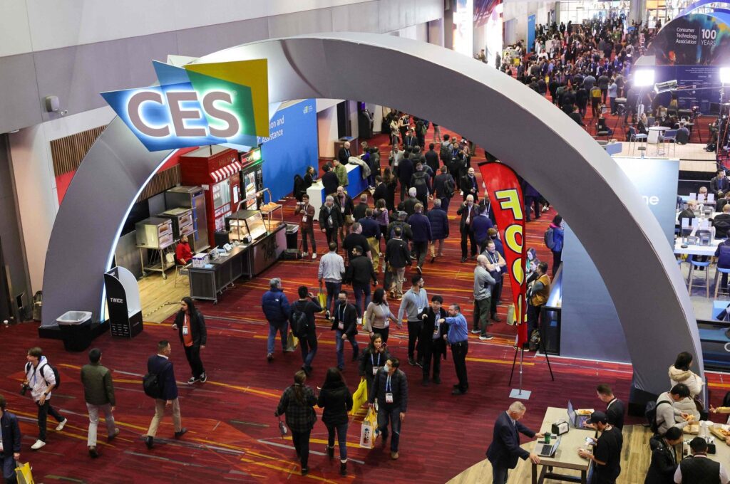 Attendees walk under a CES sign during CES 2024 at the Las Vegas Convention Center, in Las Vegas, Nevada, U.S., Jan. 10, 2024. (AFP Photo)