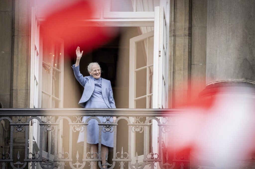 Denmark's Queen Margrethe II waves from the balcony during celebrations for her 83rd birthday, at Amalienborg Castle in Copenhagen, Denmark, April 16, 2023. (AP Photo)