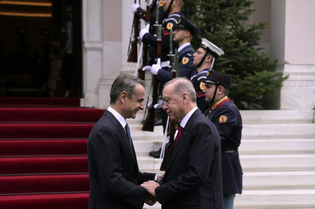 Greece's Prime Minister Kyriakos Mitsotakis (L) welcomes President Recep Tayyip Erdoğan before their meeting at Maximos Mansion in Athens, Greece, Dec. 7, 2023. (AP Photo)