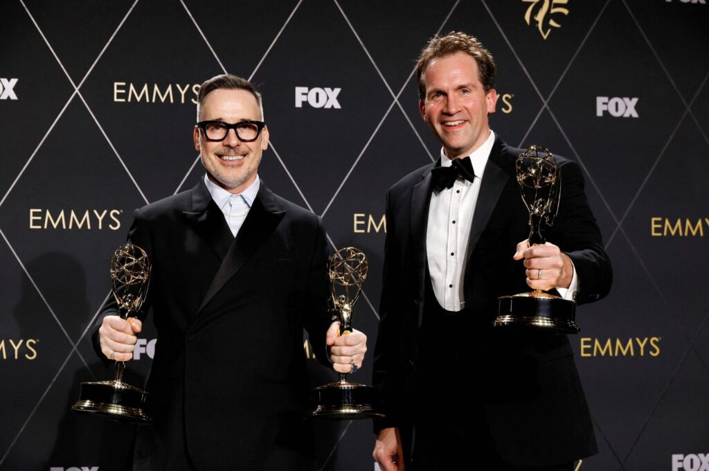 David Furnish (L) and Luke Lloyd Davies, winners of Outstanding Variety Special (Live) for "Elton John Live: Farewell From Dodger Stadium," at the 75th Primetime Emmy Awards at Peacock Theater, Los Angeles, California, U.S., Jan. 15, 2024. (AFP Photo)