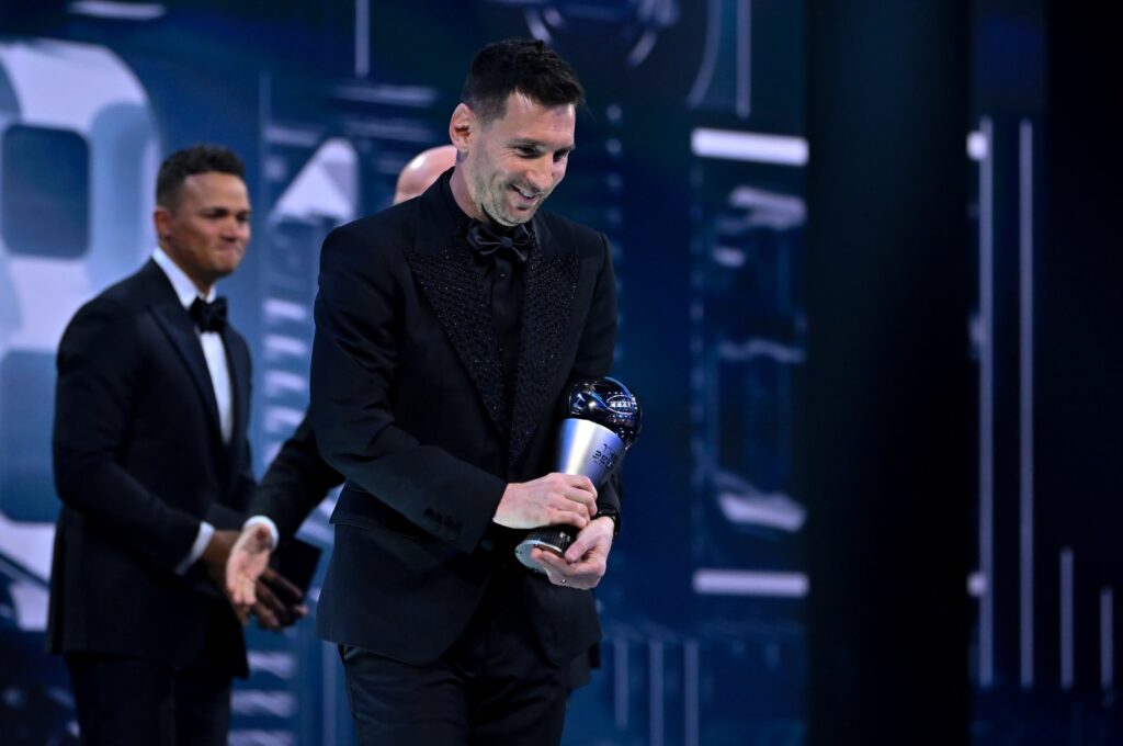 Lionel Messi (R ) with his trophy after being named The Best FIFA Mens Player during The Best FIFA Football Awards 2022 at Salle Pleyel, Paris, France, Feb. 27, 2023. (Getty Images Photo)