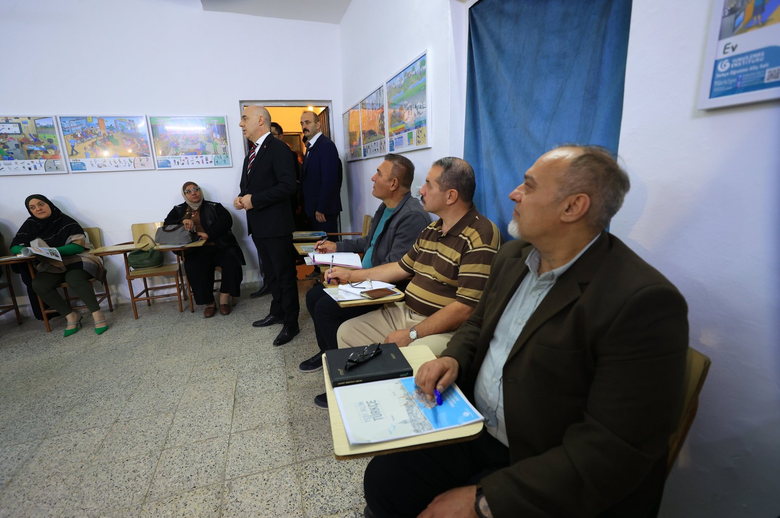 Türkiye's Ambassador to Iraq Ali Rıza Güney attends the first class for the Turkish language course opened by the Yunus Emre Institute (YEE) in Baghdad, Iraq, Jan. 16, 2024. (AA Photo)