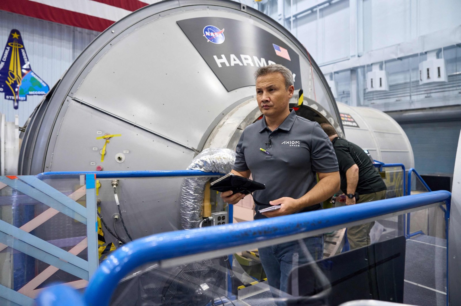 An unlocated handout picture taken on July 7, 2023 shows Turkish Astronaut Alper Gezeravcı at work at the Kennedy Space Center during the preparation of the third mission of U.S. privately funded space infrastructure "Axiom Space" scheduled for Jan. 17, 2024. (AFP via Axiom Space)