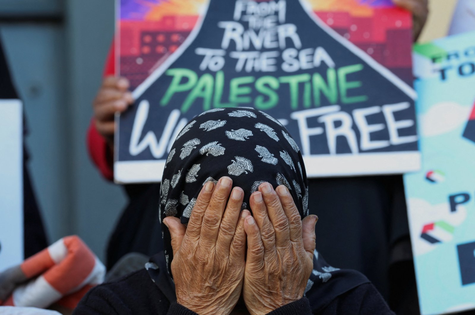 A woman reacts during an interfaith prayer service in Bo-Kaap for the success of the South African Government's genocide case, which accuses Israel of genocide in the Gaza war, at the International Court of Justice in the Hague, in Cape Town, South Africa, Jan. 10, 2024. (Reuters Photo)
