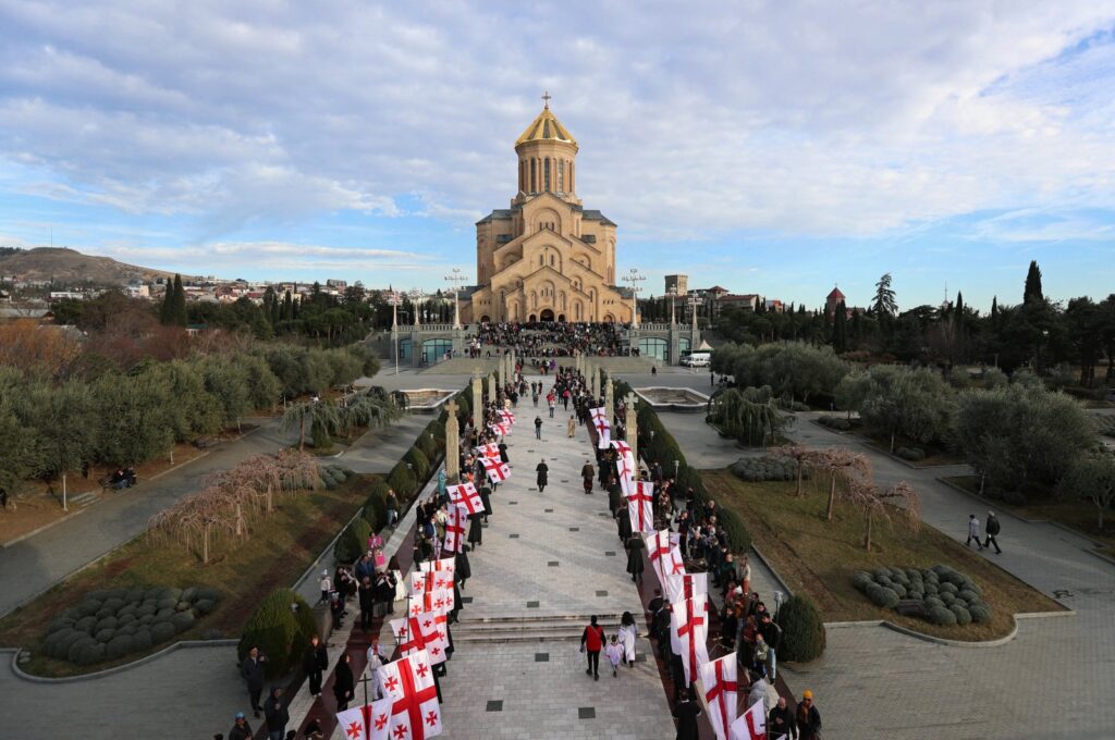 People gather near the Holy Trinity Cathedral, also known as Sameba, during the traditional religious procession Alilo celebrating Orthodox Christmas in Tbilisi, Georgia, Jan. 7, 2024. (Reuters Photo)