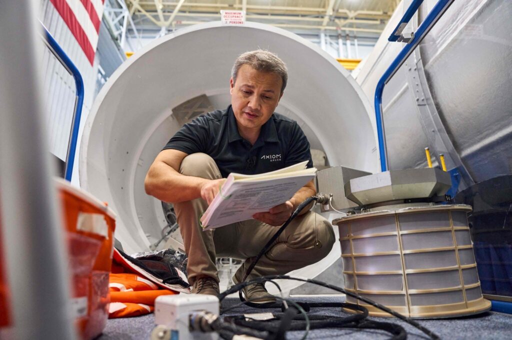 An unlocated handout picture shows Türkiye's first astronaut  Alper Gezeravci at work during the preparation of the third Axiom mission, Aug. 8, 2023. (AFP Photo)