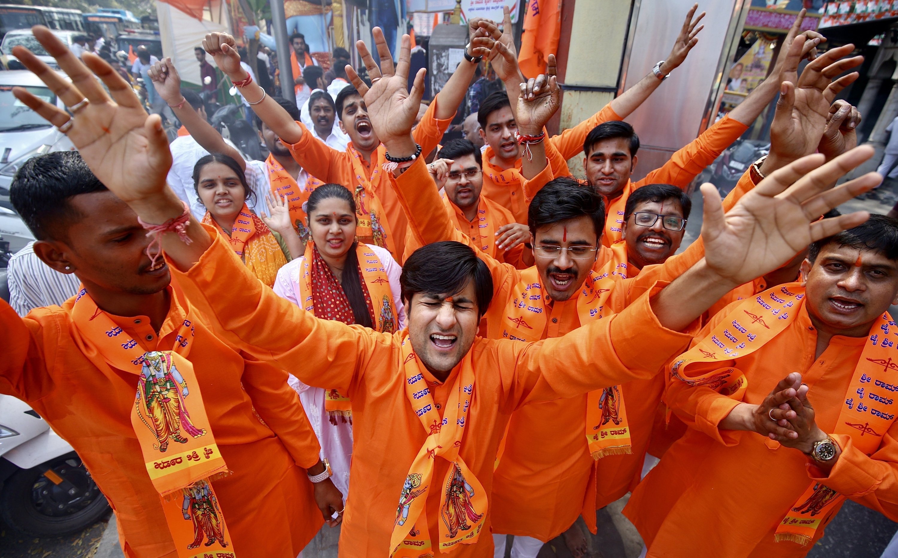 311331 Hindu devotees chant as they watch the live coverage of the inaugural ceremony of the Ayodhya Lord Ram Temple, Bengaluru, India, Jan. 22, 2024. (EPA Photo)