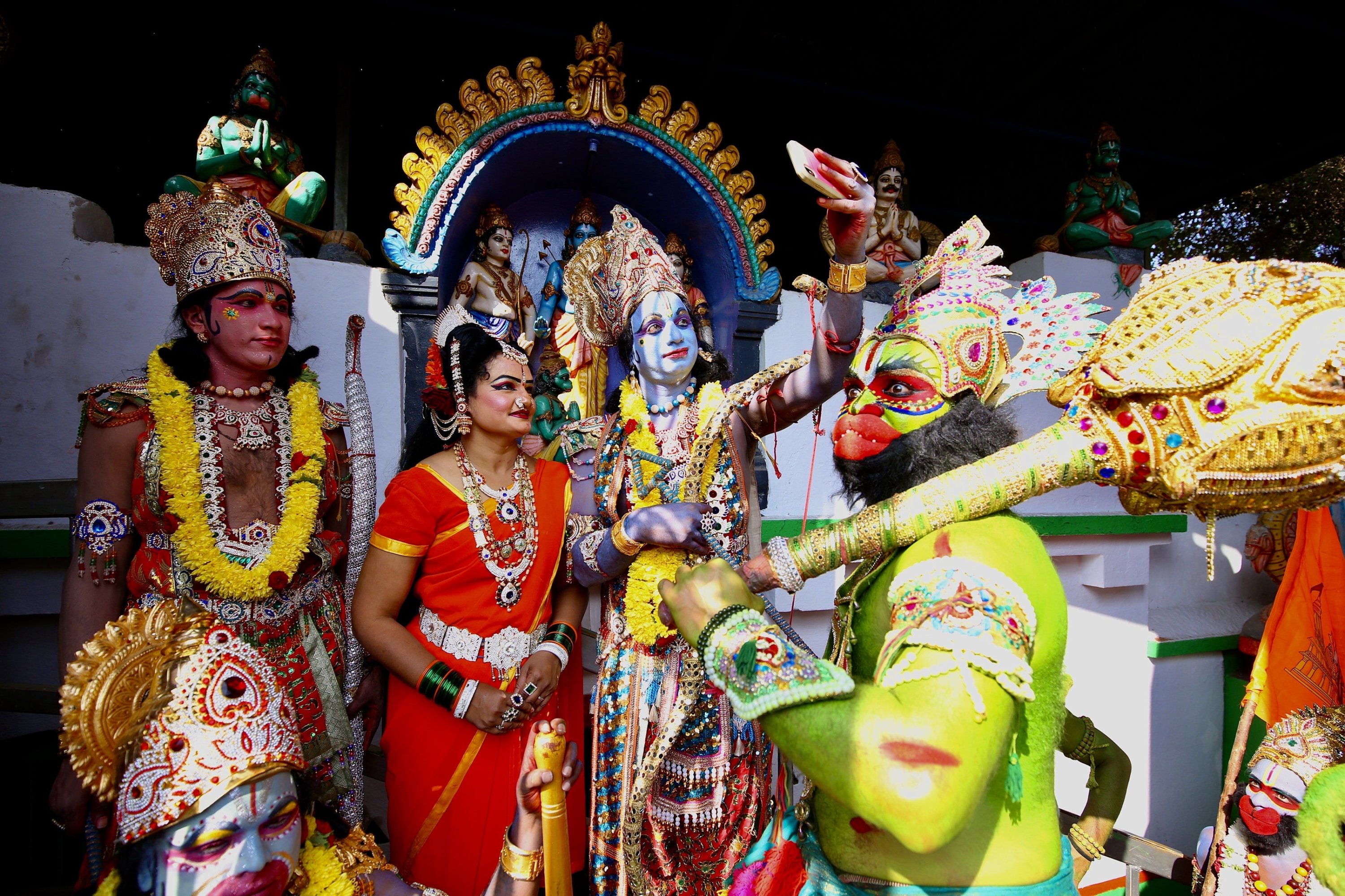 311335 Indian folk artists attired like Rama, Sita, Laxmana and Hanuman perform at the inaugural ceremony of the Ayodhya Lord Ram Temple, Bengaluru, India, Jan. 22, 2024. (EPA Photo)