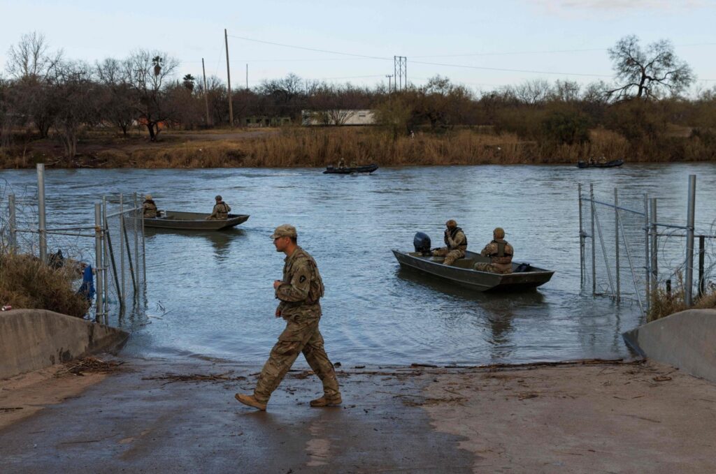 Texas National Guard soldiers patrol the Rio Grande near Shelby Park on Jan. 26, 2024. (AFP Photo)