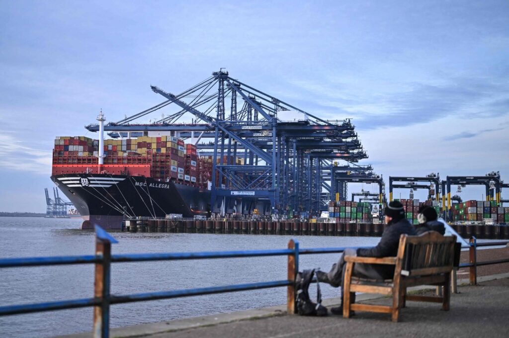 Stacks of containers are pictured on the deck of the MSC Allegra container ship, docked beside container cranes at the U.K.'s largest freight port, in Felixstowe on the East coast of England, U.K., Jan. 27, 2024. (AFP Photo)