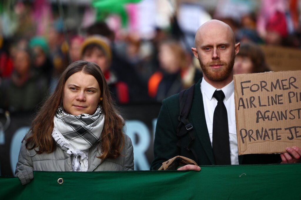 Greta Thunberg joins Extinction Rebellion in protesting private jet flight expansion at Farnborough Airport, England, Jan. 27, 2024. (AFP Photo)