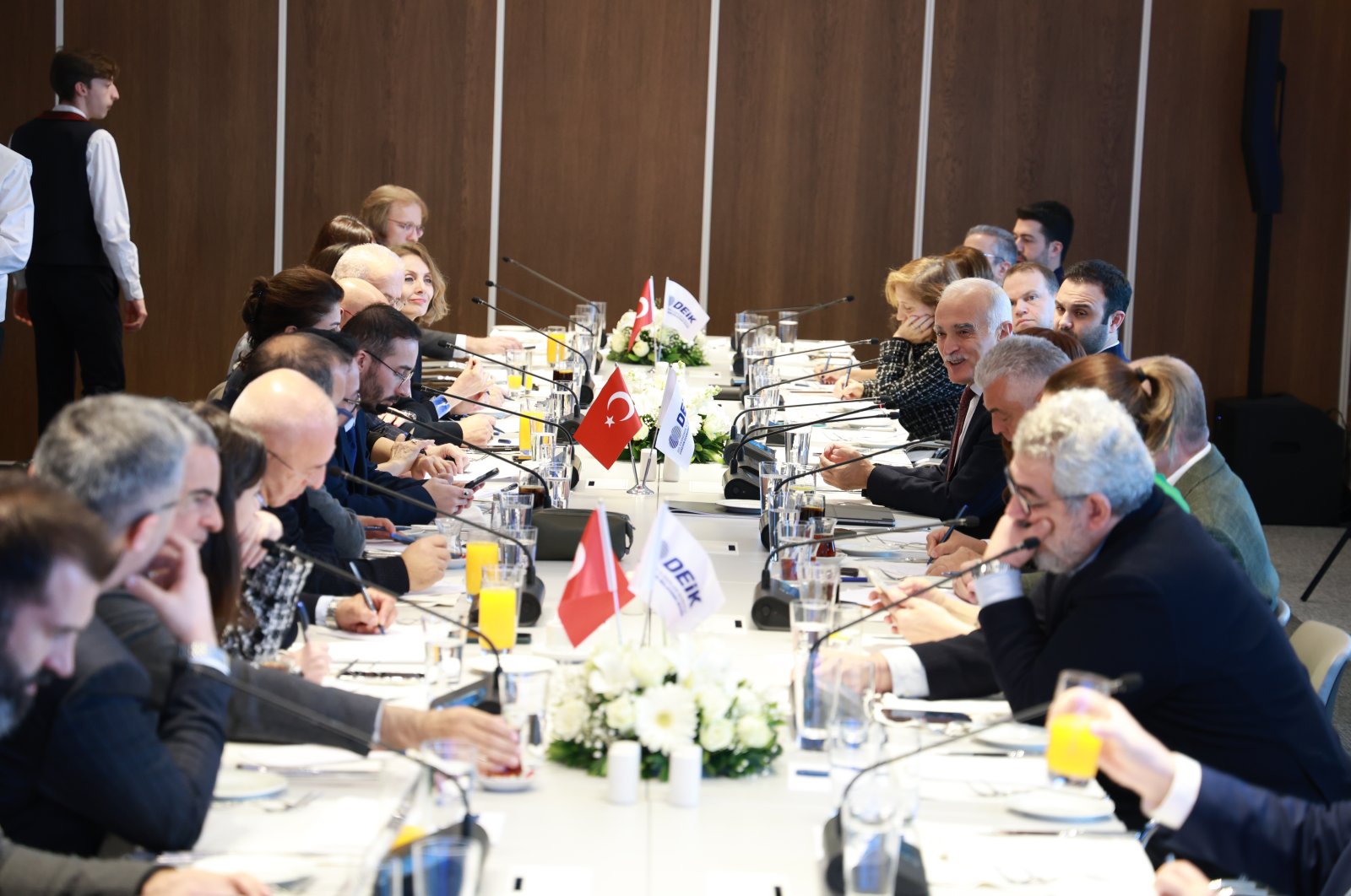 Nail Olpak (C-R), head of the Foreign Economic Relations Board (DEIK), speaks during a meeting with journalists, Istanbul, Türkiye, Jan. 31, 2024. (Courtesy of DEIK)