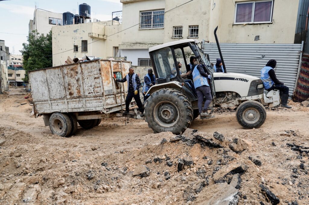 Members of UNRWA work, following an Israeli raid, in Jenin camp, in the Israeli-occupied West Bank Jan. 29, 2024. (Reuters Photo)