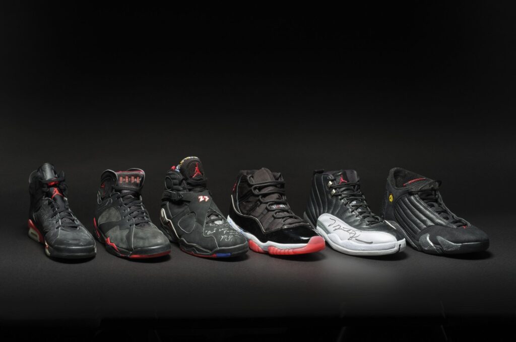 A collection of sneakers dubbed the "Dynasty Collection" that superstar Michael Jordan wore as he and the Chicago Bulls won six NBA championships, Feb. 2, 2024. (AP Photo)
