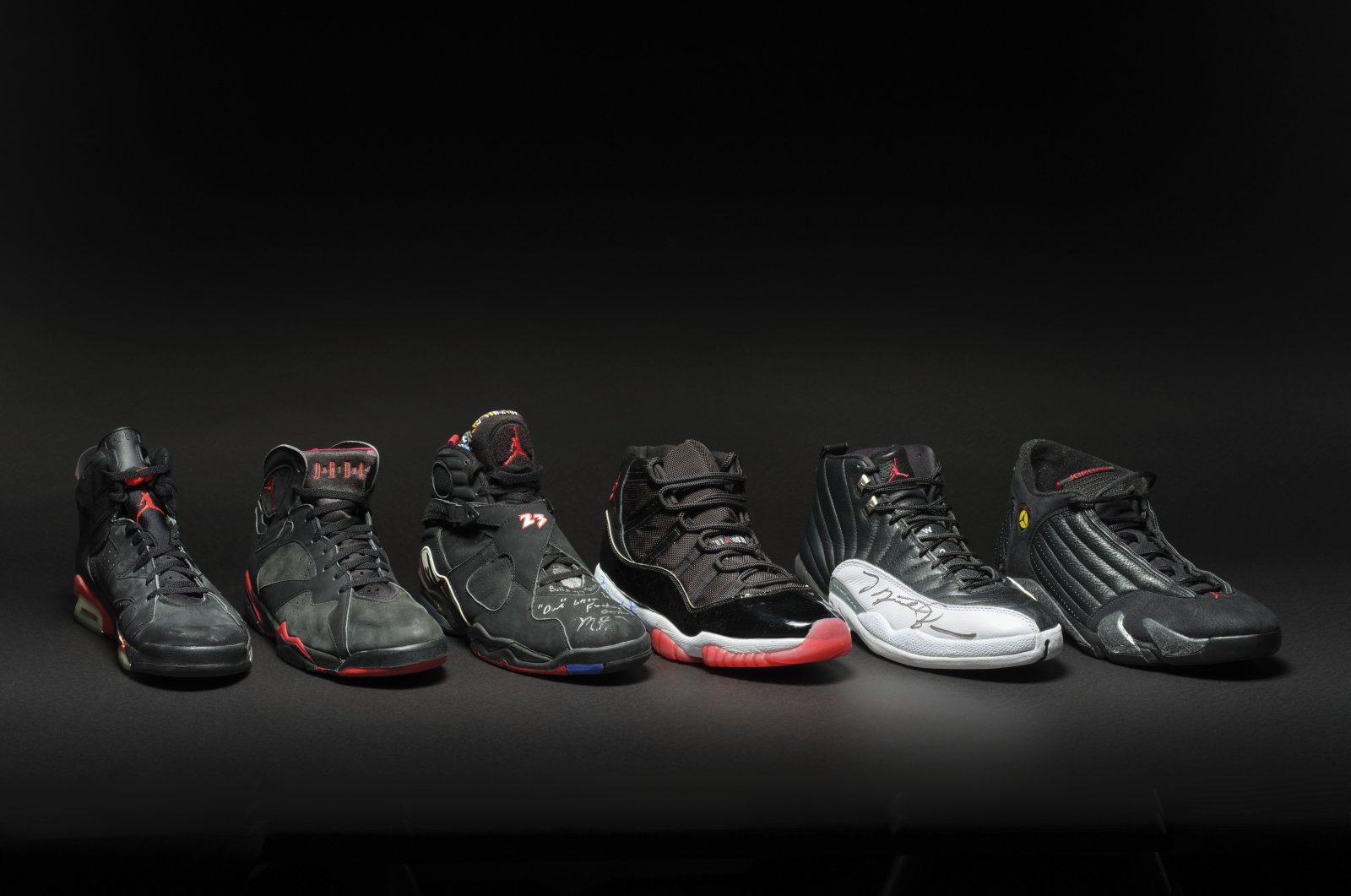 A collection of sneakers dubbed the "Dynasty Collection" that superstar Michael Jordan wore as he and the Chicago Bulls won six NBA championships, Feb. 2, 2024. (AP Photo)