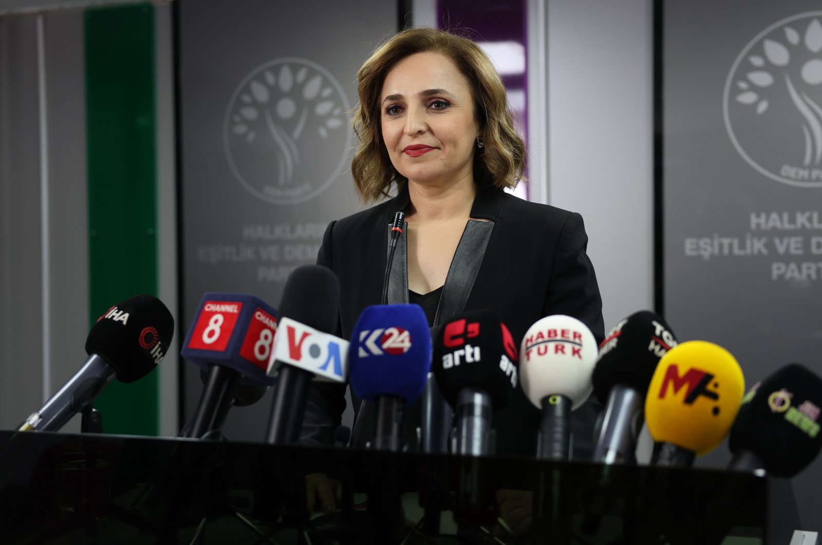 YSP spokesperson Ayşegül Doğan announced the party's election decision at a news conference in the capital Ankara, Türkiye, Feb. 4, 2024. (DHA Photo)