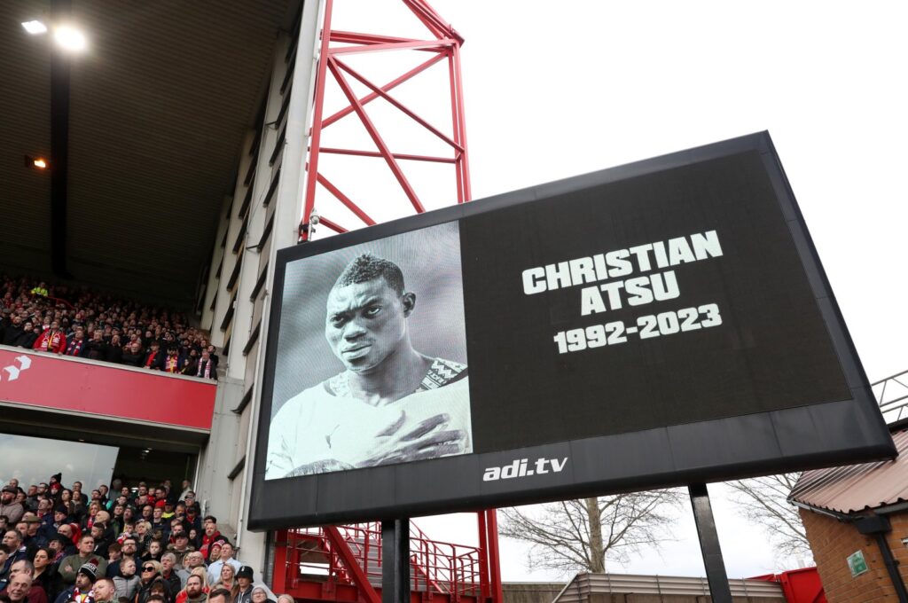 An image of Christian Atsu, who was recovered from the rubble of his home in Hatay following the Türkiye earthquake, is shown on the screen as a minute's silence is observed in his memory prior to the Premier League match between Nottingham Forest and Manchester City at City Ground, Nottingham, U.K., Feb. 18, 2023. (Getty Images Photo)