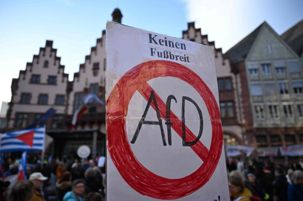 A sign reading "not yield an inch for AfD (Alternative für Deutschland)" is held during a demonstration against racism and far-right politics in Frankfurt am Main on Feb. 5, 2024. (AFP Photo)