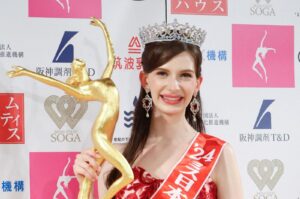 Ukrainian-born Karolina Shiino, now a naturalized Japanese citizen, poses with the Miss Japan crown in Tokyo, Japan. (AFP Photo)