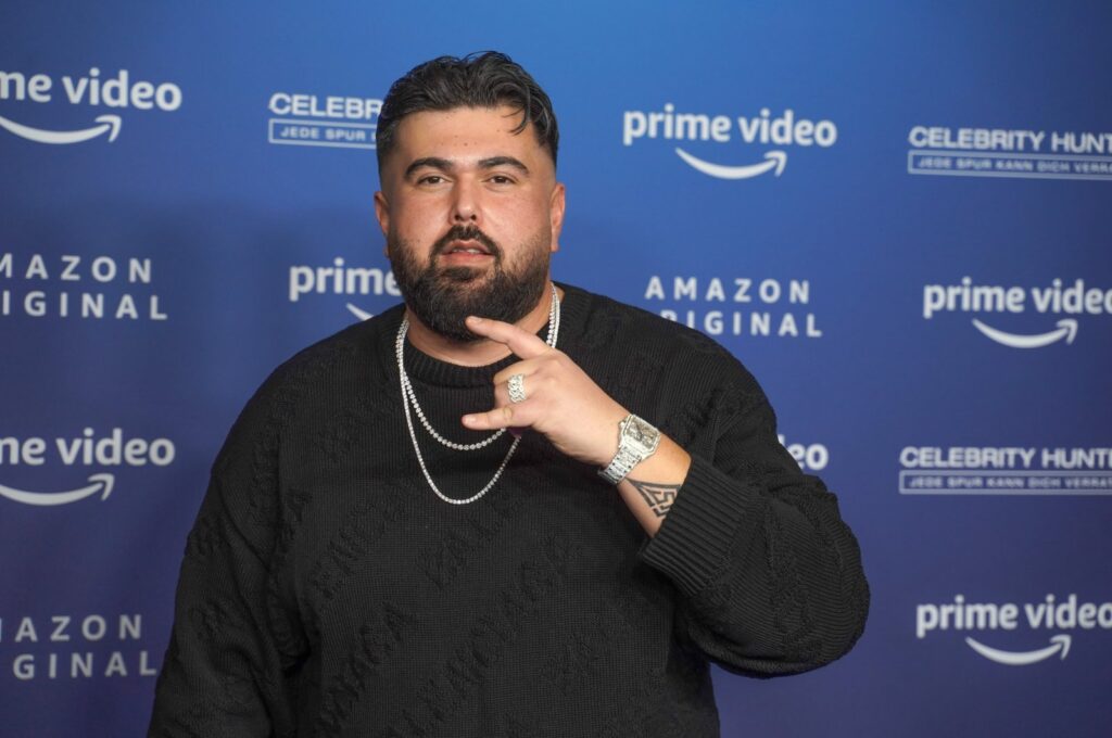 Musician Summer Cem arrives at the Zoo Palast for a photo session on the occasion of the Amazon series "Celebrity Hunted," Berlin, Germany, Nov. 25, 2021. (Getty Images Photo)
