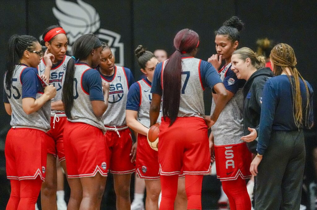 The U.S women's national team head coach Cheryl Reeve (2nd L) speaks to her players after practice during the team's training camp, New York, U.S., Feb. 4, 2024. (AP Photo)