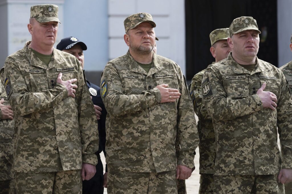 Commander-in-Chief of Ukraine's Armed Forces Valeriy Zaluzhny (C) attends an event for marking Statehood Day, Kyiv, Ukraine, July 28, 2023. (Ukrainian Presidential Press Office via AP)