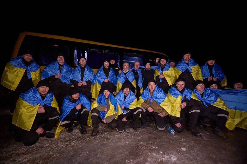 This handout photograph released by the Ukrainian Presidential Press Service on Feb. 8, 2024, shows Ukrainian prisoners of war (POWs) posing for a photo following a swap at an undisclosed location in Ukraine. (AFP Photo)