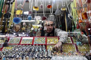 A ring seller and manufacturer displays stone rings in his shop at the old bazaar in the city of Shahr-e Ray (Rey), south of Tehran, Iran, Jan. 8, 2024. (AFP Photo)