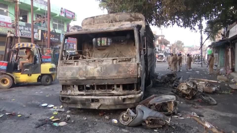 The remains of a charred vehicle are seen in Haldwani, Uttarakhand, India, Feb. 9, 2024. ()