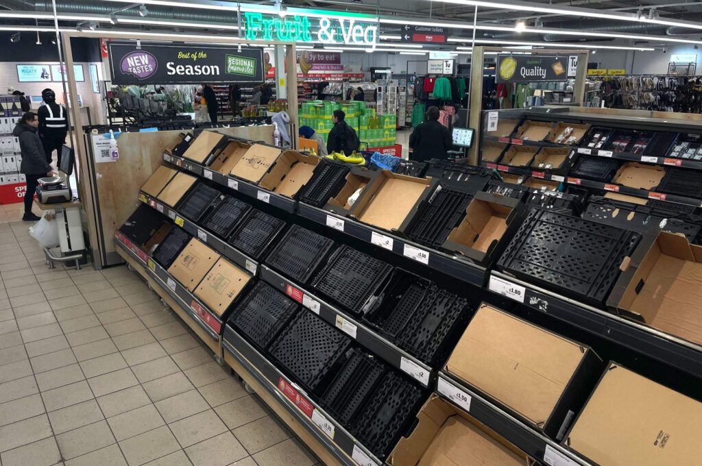 A photograph shows empty shelves at a Sainsbury's supermarket in east London, U.K., Feb. 24, 2023. (AFP Photo)