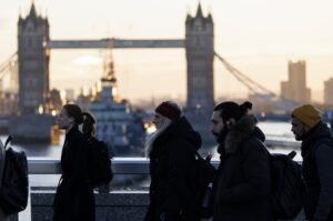 Commuters cross London Bridge on a cold morning in London, Britain, Jan. 16, 2024. (EPA Photo)