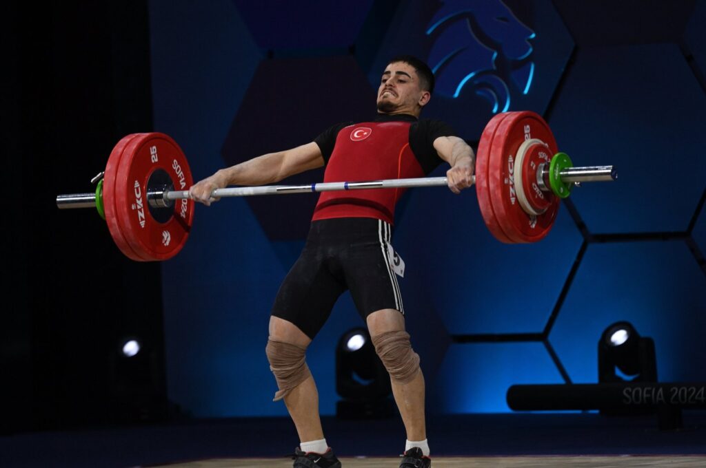 Türkiye's Kaan Kahriman in action during the men's 67 kg. category at the 2024 EWF European Weightlifting Championships, Sofia, Bulgaria, Feb. 14, 2024. (EPA Photo)