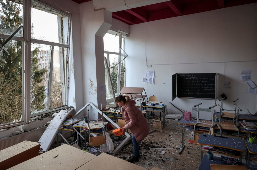 A woman stands inside a school destroyed during a Russian missile strike, amid Russia's attack on Ukraine, Lviv, Ukraine, Feb. 15, 2024. (Reuters Photo)