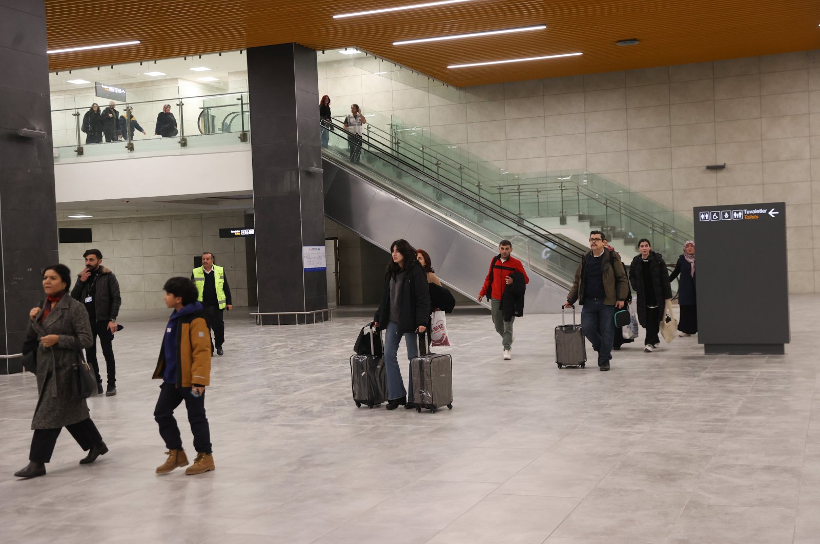 Passengers are photographed at a new terminal of Kayseri Airport, central Türkiye, Feb. 3, 2024. (AA Photo)