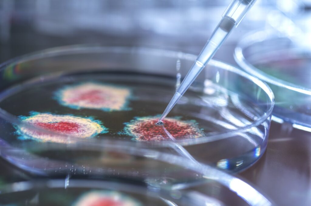A scientist pipetting a potential cure for a virus in the lab in an unspecified location in the U.K., April 23, 2020. (Getty Images, File Photo)