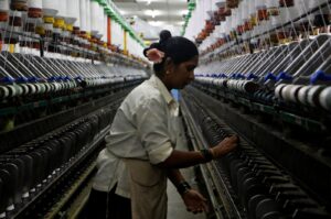A woman works at a textile mill in Mumbai, India, March 8, 2018. (Reuters Photo)