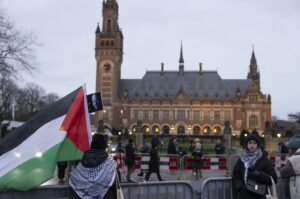 Pro Palestinian protesters stand in front of the International Court of Justice where a second day of hearings take place after South Africa has requested the International Criminal Court to indicate measures concerning alleged violations of human rights by Israel in the Gaza Strip, The Hague, Netherlands, Jan. 12, 2024. (Getty Images Photo)