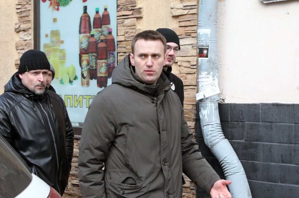 Russian opposition leader Alexei Navalny stands outside of Zamoskvoretsky District Court during a protest rally, Moscow, Russia, Feb. 21, 2014. (Getty Images Photo)