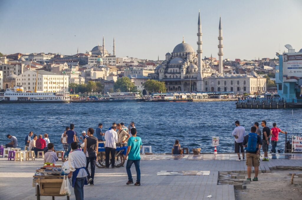 People enjoy the sunny weather in Emiönü, Istanbul, Türkiye, Feb. 7, 2024. (Getty Images)