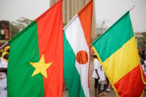 Flags of Burkina Faso, Niger and Mali are seen during a demonstration that was called by Mali's Junta to support their decision to leave the Economic Community of West African States regional bloc ''ECOWAS'', in Bamako, Mali, Feb. 1, 2024. (Reuters File Photo)
